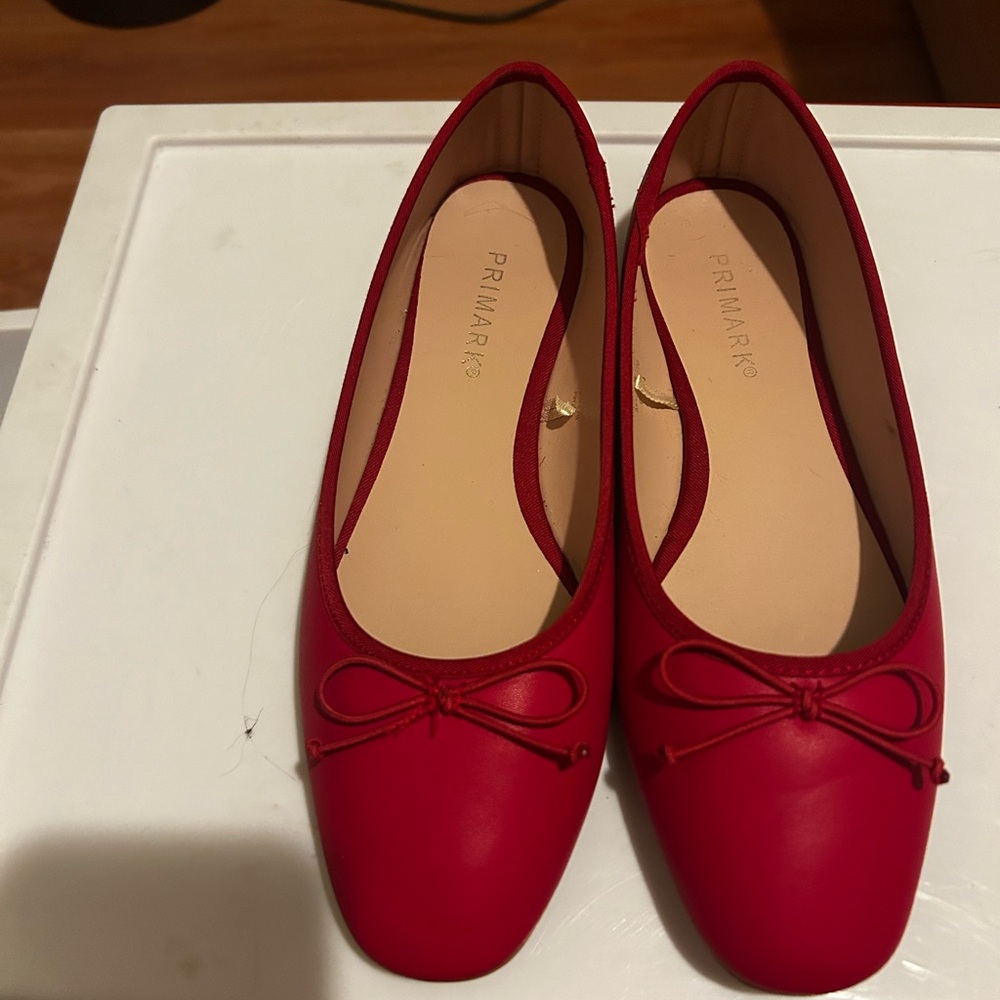 Primary red ballet slippers worn once